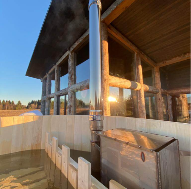 Купель и панорамное остекление дома Post and Beam из Кело